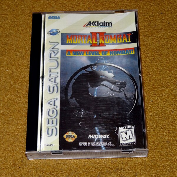 Custom printed Mortal Kombat 2 Sega Saturn manual, & case insert (see variations below)