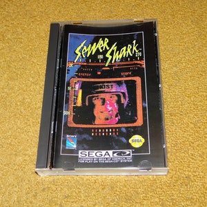 Custom printed Sega CD Sewer Shark manual, & case insert (see variations below)