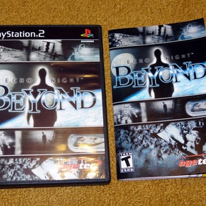 May include: PlayStation 2 video game case and instruction booklet for Echo Night: Beyond. The case is black with a silver PlayStation 2 logo. The cover art features a silhouette of a person standing in front of a blue and white planet. The instruction booklet is white with a blue and white design. The title "Echo Night: Beyond" is printed in white on a black background.