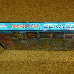 Manuel imprimé personnalisé sur CD Dragon's Lair Sega et insert dans le boîtier voir les variantes ci-dessous image 2