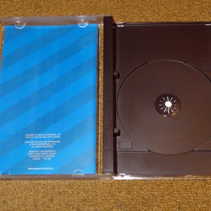 Manuel imprimé personnalisé sur CD Dragon's Lair Sega et insert dans le boîtier voir les variantes ci-dessous image 3