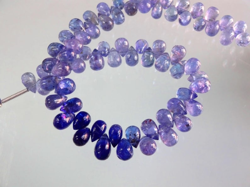 8-inch AAA quality Tanzanite smooth plain teardrop size 6.5-7mm 81cts GW3015