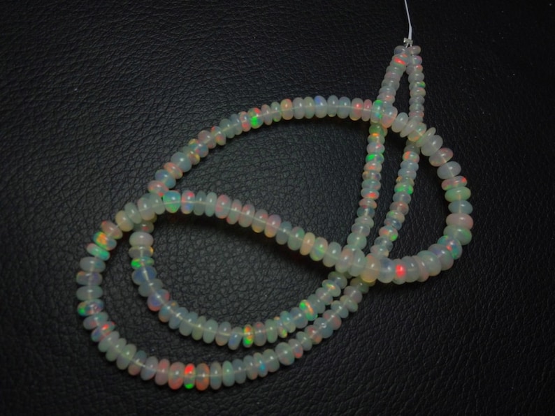 Natural AAA quality Ethiopian Opal smooth plain rondelle beads size 4.5-5.75mm sold per 16-inch strand GW884