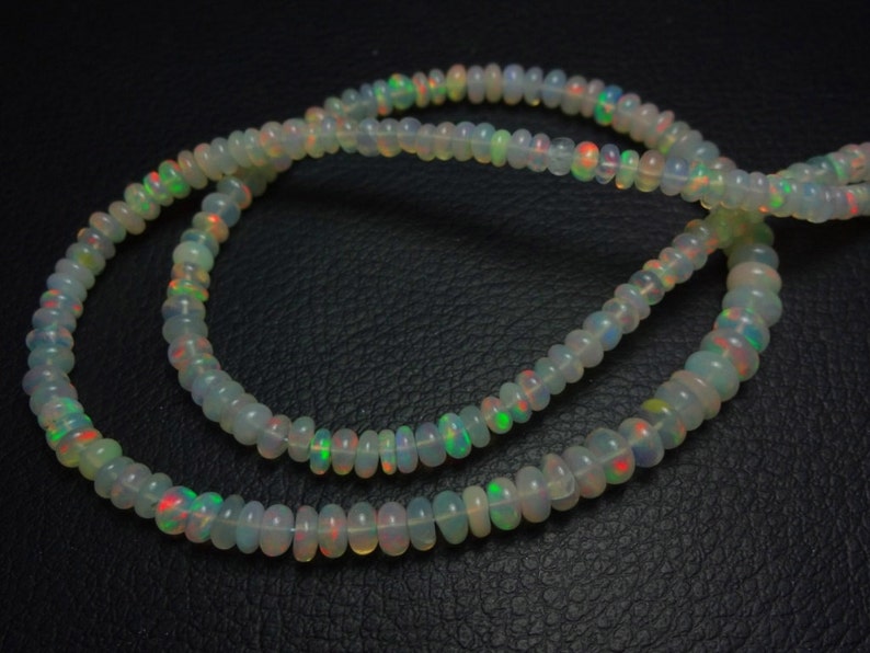 Natural AAA quality Ethiopian Opal smooth plain rondelle beads size 4.5-5.75mm sold per 16-inch strand GW884