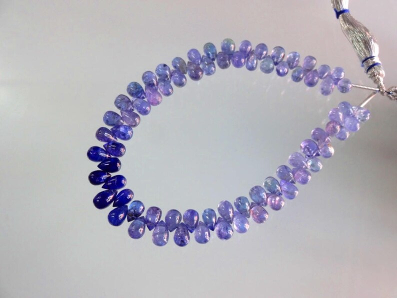 8-inch AAA quality Tanzanite smooth plain teardrop size 6.5-7mm 81cts GW3015