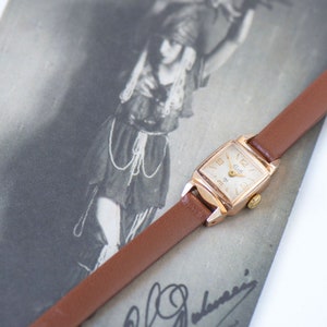 Vintage Slava Women&#39;s Watch: Gold Tone, Arabic Numerals, New Leather Band