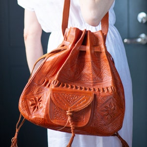 Tooled leather bucket bag African caramel brown women shoulder bag vintage. Bag with drawstring top handle. Handmade crossbody bag summer