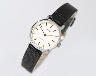 Minimalist women wristwatch vintage ZARIA. Mint condition watch silver tone lady gift. Shockproof watch jewelry. New premium leather strap