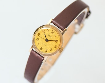 Vintage unused Zaria Women's Watch Gold Plated classic case, Yellow dial Arabic numerals, Leather Strap,