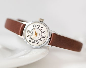 Vintage lady watch SLAVA delicate. Arabic numerals women watch silver shade. Wristwatch classic gift for women jewelry. Premium leather band