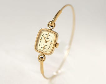 Authentic vintage cocktail watch for women CHAIKA, gold plated women's watch minimalist serviced, rectangular tiny beige dial and bracelet