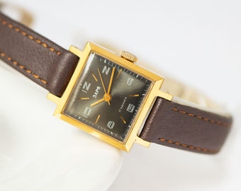 Vintage Zaria Watch Unused: Gold Plated Square case, Black Arabic numerals dial, New Leather Band