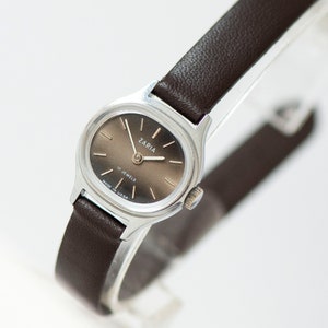 Women watch classic vintage ZARIA grey. Unused watch for woman silver shade. Wristwatch minimalist jewelry gift. Premium leather strap new