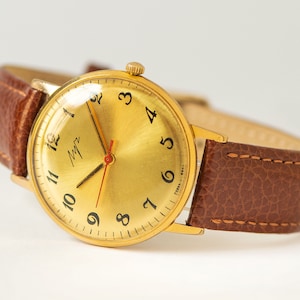 Slim unisex wristwatch minimalist RAY. Authentic tomboy wristwatch gold plated jewelry gift. Boyfriend wristwatch serviced leather strap