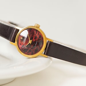 Vintage Slava Women&#39;s Watch: Gold Plated Cheetah Dial, Leather Strap