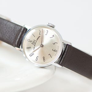 Vintage Luch Ray Women&#39;s Watch: Silver Dial, New Leather Band