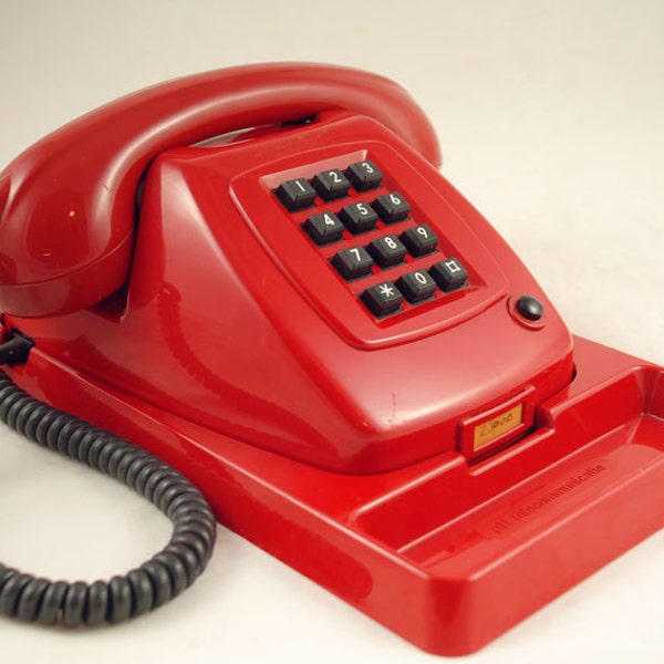 Vintage Dutch telephone 1970s red colored with holder
