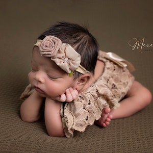 Newborn girl photo outfit in cream or pink lace romper and headband. Newborn photography