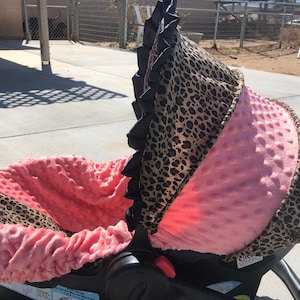 leopard/cheetah and coral minky car seat cover and hood cover with ruffle head headrest strap covers handle cushion
