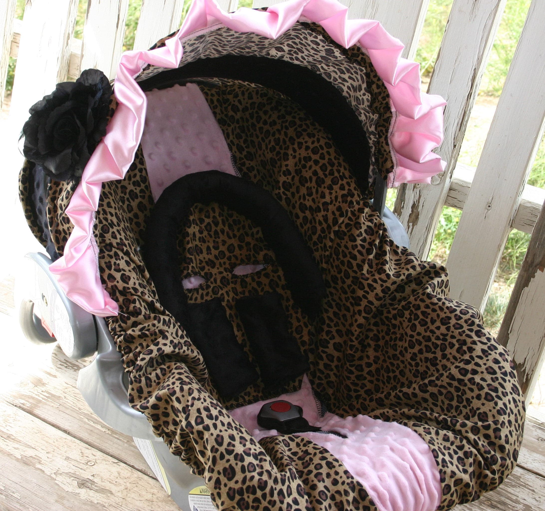 infant headsupport and matching strap covers leopard/ cheetah and black minky 