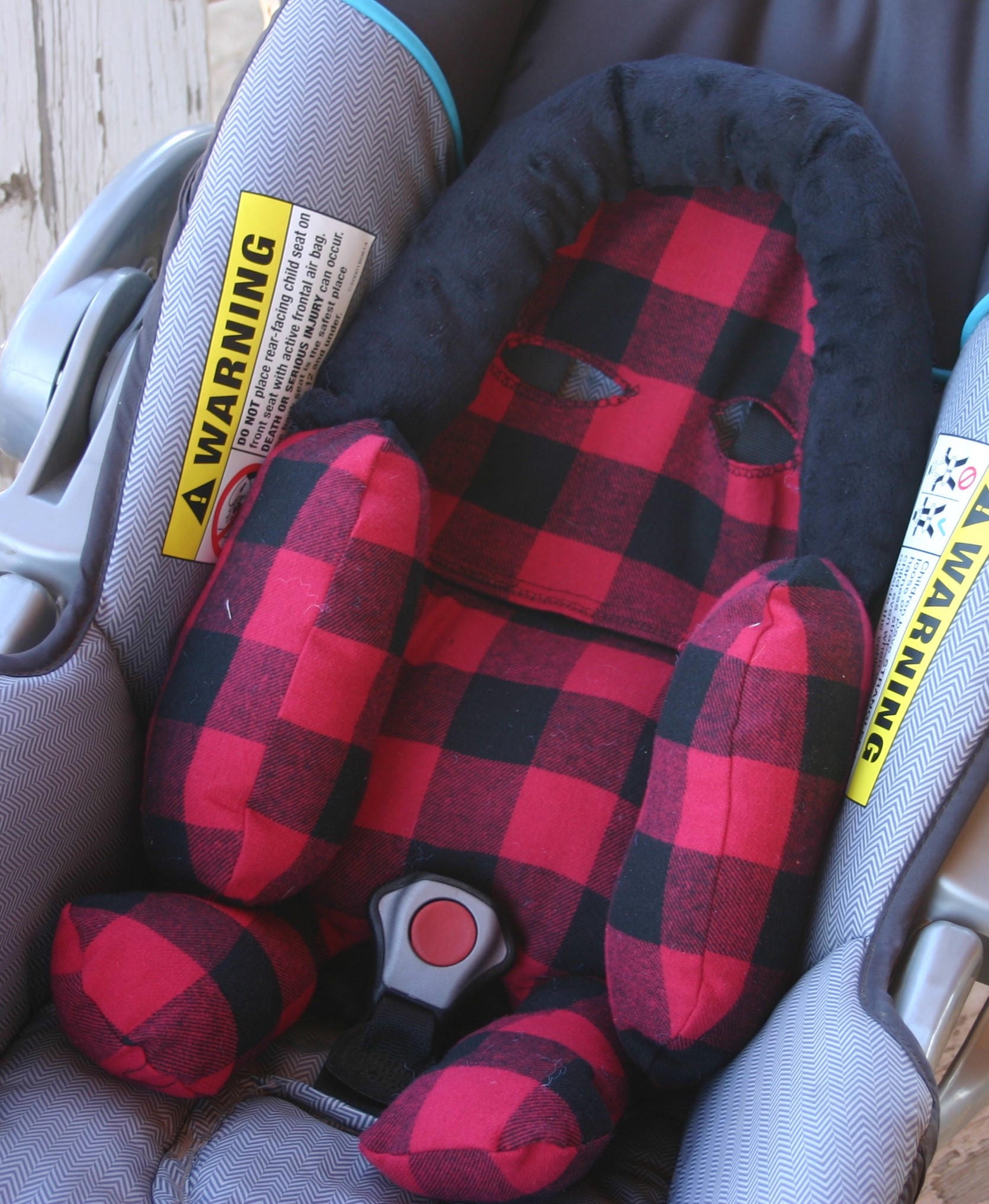 infant strap covers in red and black buffalo plaid with black minky