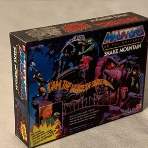 Vintage Original Mattel MOTU Masters of the Universe SNAKE MOUNTAIN play set Miniature Toy Box Christmas Ornament / Refrigerator Magnet