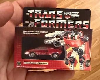 Adorno navideño vintage original Hasbro G1 Transformers SIDESWIPE con imán en miniatura para caja de juguetes