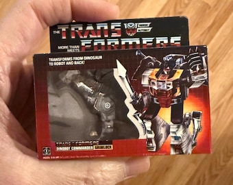 Adorno navideño en miniatura con imán de la figura vintage original de Hasbro G1 Transformers Autobot Dinobot GRIMLOCK en caja de juguetes Autobot Dino G1 Transformers Autobot Dinobot Grimlock.