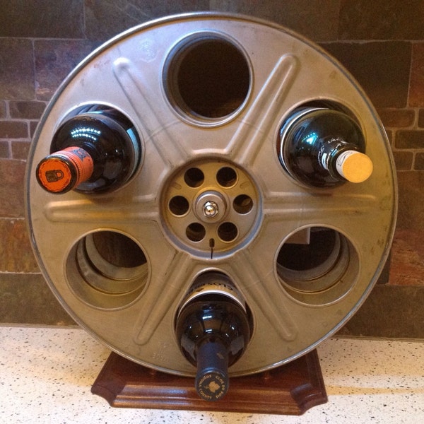 Film Reel Wine Rack made from vintage 35mm movie motion picture film reels ~~unique~~art deco~~