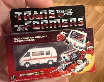 Adorno navideño vintage original Hasbro G1 Transformers RATCHET con imán en miniatura para caja de juguetes