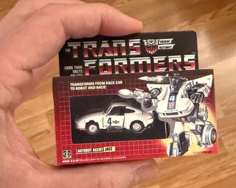 Figura de juguete miniatura con imán vintage original Hasbro G1 Transformers JAZZ, adorno navideño
