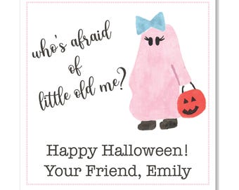 May include: A square card with a pink ghost illustration holding a jack-o'-lantern bucket. The text reads "who's afraid of little old me?" and "Happy Halloween! Your Friend, Emily."