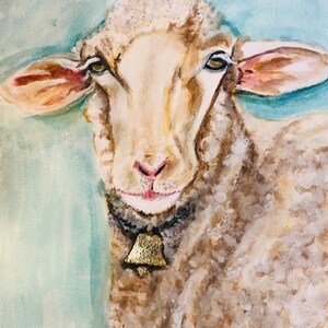 May include: A watercolor painting of a sheep with a gold bell around its neck. The sheep is looking directly at the viewer with a gentle expression. The background is a light blue.