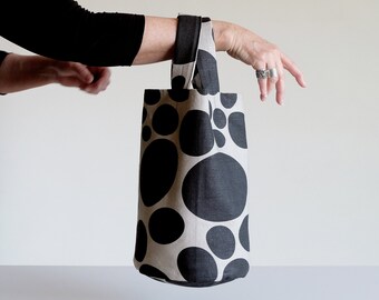 Mod bucket tote bag with black dots on beige, round bottom linen bag, stylish neutral statement tote, minimal luxe accent