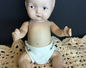 Baby doll, composition, vintage