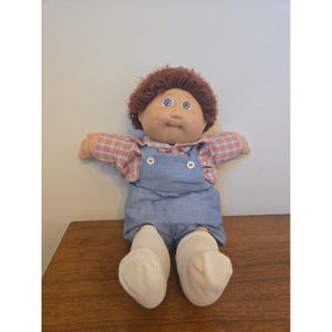 Molde de cabeça de boneco Cabbage Patch nº 1, cabelo ruivo, olhos castanhos e verdes, 1982, corpo macio.