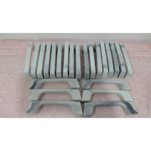May include: A collection of twenty cabinet handles featuring a white and grey marbled pattern. The set includes fourteen vertical handles arranged in two rows and six horizontal handles positioned in two stacks of three, all with a smooth finish.