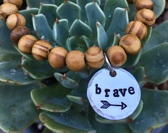 Wood beaded bracelet + hand stamped brave charm - be brave - inspirational jewelry - arrow -  Love Squared Designs