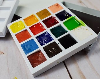 Watercolor Travel Palette 2.5 square x 1/2 inches. Hold 25 colors & 9 colors Thick