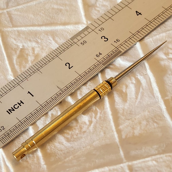 Bookbinding travel brass punch  awl. Collapsible with a fine tip.