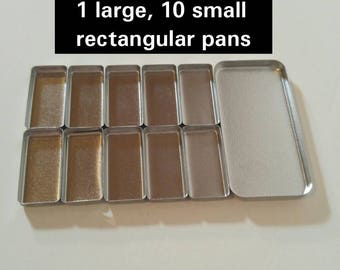 Refill paint pans sets for use with Travel Palette Watercolor. Clear coated