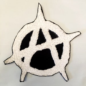 May include: White embroidered anarchy symbol patch with a black background. The symbol is a circle with a stylized "A" inside.