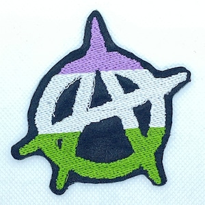 May include: Embroidered patch featuring the anarchy symbol, a capital "A" within a circle. The patch has a black border, with the top section in lavender, the middle in white, and the bottom in green. The patch is likely for clothing or accessories.