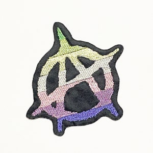 May include: A rainbow-colored embroidered patch with a stylized anarchy symbol.
