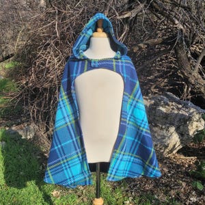 May include: A set of three ceramic mugs with a speckled, matte finish. The mugs are in shades of cream, light gray, and dark gray. Each mug has a simple, minimalist design, perfect for coffee or tea.