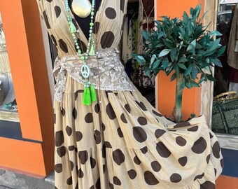 Long dress in cotton voile with large contrasting polka dot print.