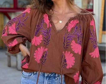 Cotton blouse with boat neck.