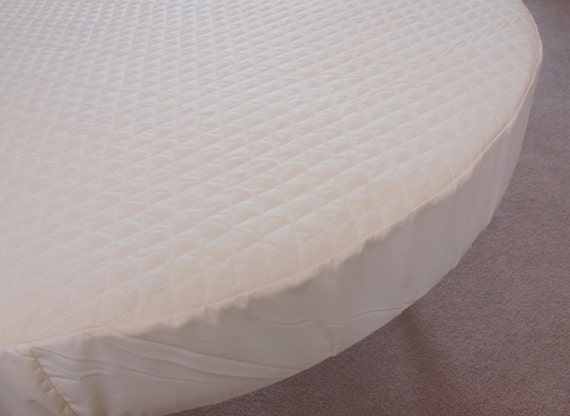 round crib mattress pad