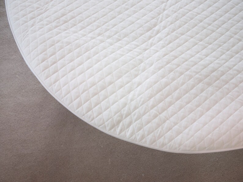 round crib mattress pad
