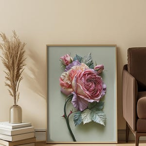 May include: A framed floral art print featuring a large, detailed rose in shades of pink, purple, and peach. The rose is the focal point, with green leaves and a thorny stem. The artwork is set against a light green background.